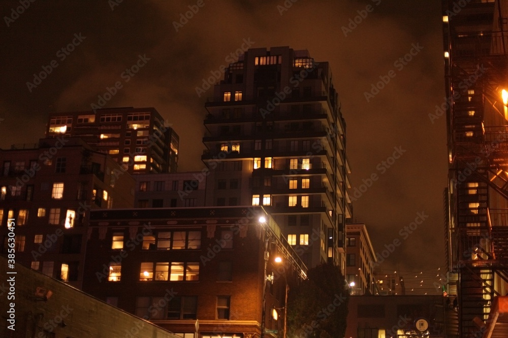 City at night. Rainy evening. Foggy atmosphere. High skyscrapers. Downtown Seattle.