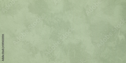 Wall paper design. Light green textured concrete surface as background © New Africa