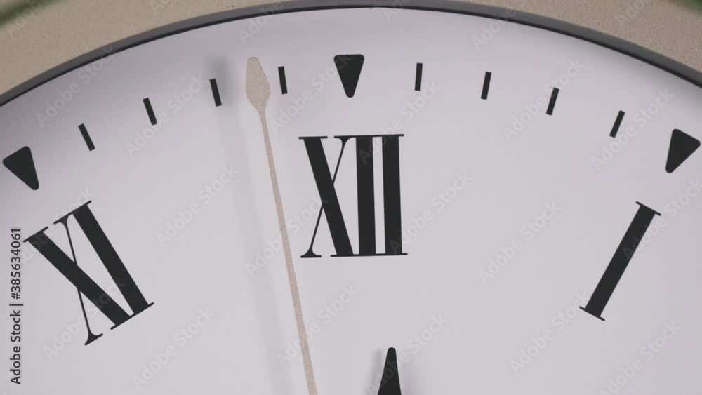 Closeup Twelve o'clock classic Face With Roman Numerals. Closeup Twelve o'clock classic Face With Roman Numerals.