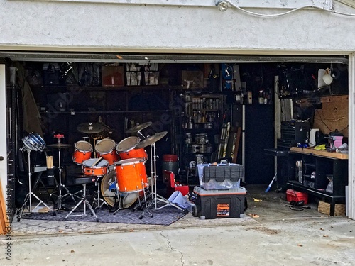 Red color drums in the garage sale