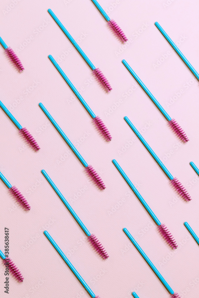 Eyelash brushes on a pink background, pattern. Eyelash brushes on a pink background, pattern.