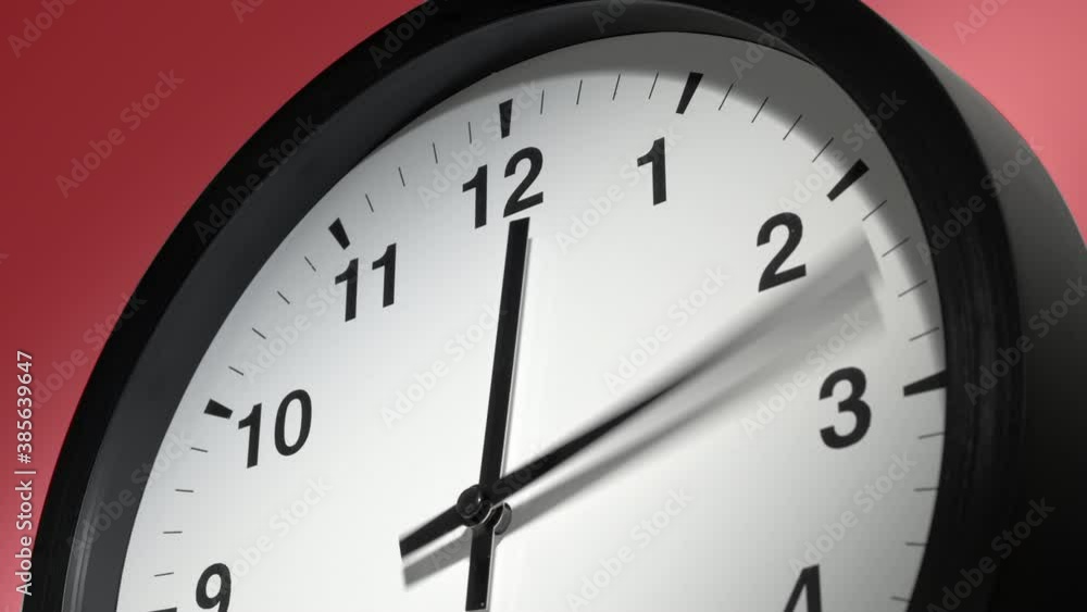 Clock Face in Time Lapse on Red Burgundy Cherry Wall in Office