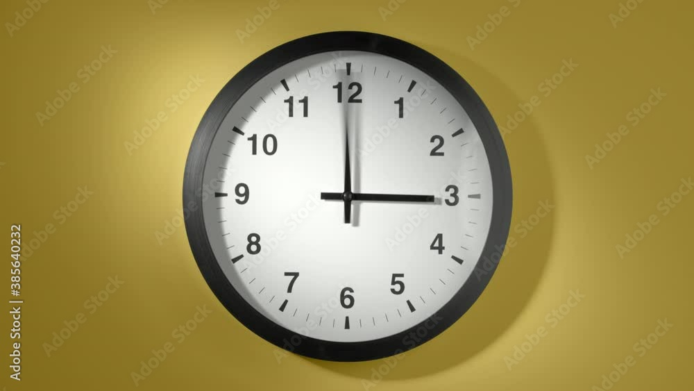 Clock Face in Time Lapse on Yellow Wall in Office Clock Face in Time Lapse on Yellow Wall in Office