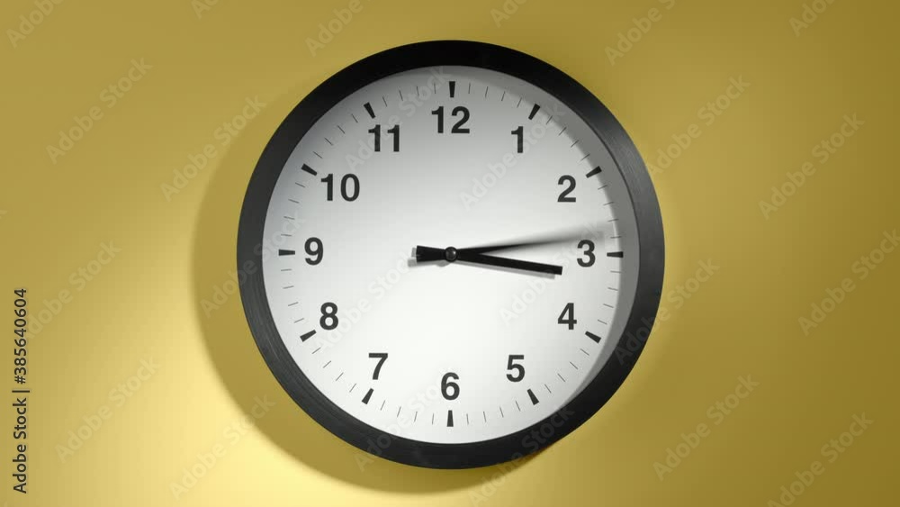 Clock Face in Time Lapse on Yellow Wall in Office Clock Face in Time Lapse on Yellow Wall in Office