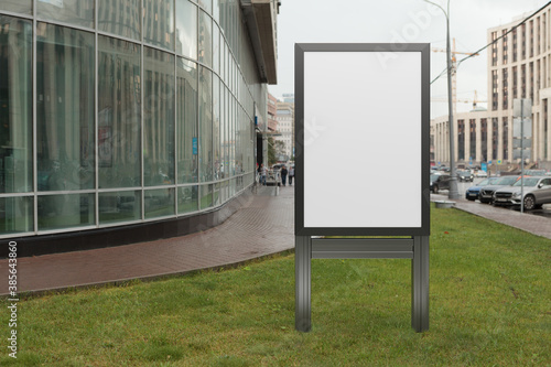Fototapeta Naklejka Na Ścianę i Meble -  Advertising billboard stand mock up on the street.