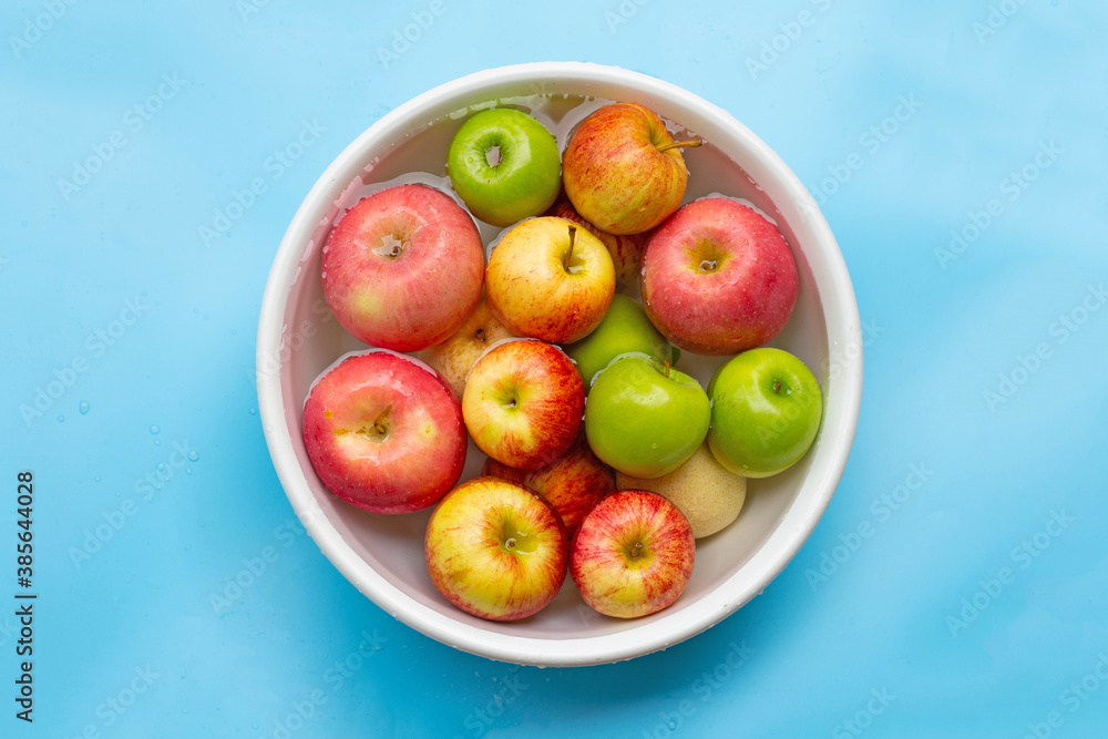 Washing fresh apples in the water Washing fresh apples in the water