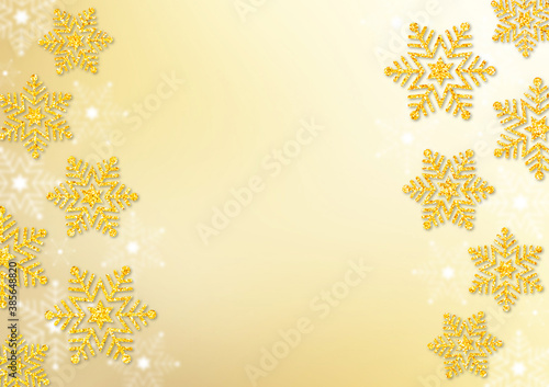 金色のラメの雪の結晶 金色のグラデーション背景 冬の背景素材