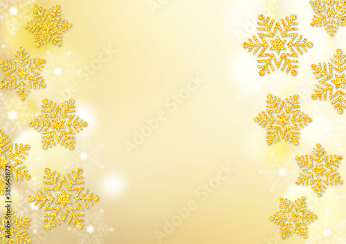金色のラメの雪の結晶 金色のグラデーション背景 ふわふわの透明なドット 冬の背景素材