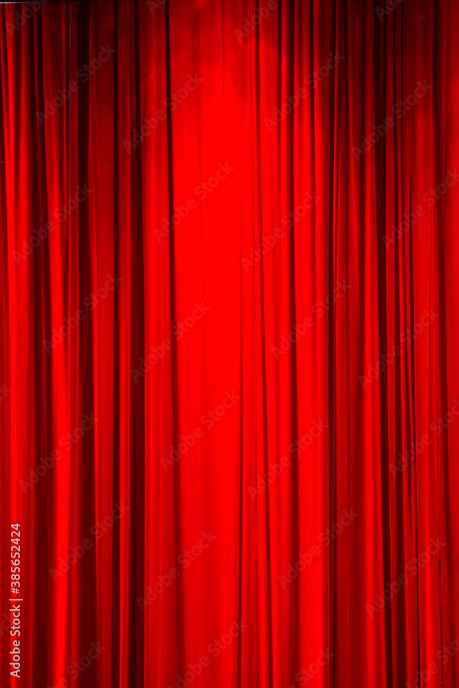 Red curtain background or backdrop copy-space, with folds and creases. Red curtain background or backdrop copy-space, with folds and creases.