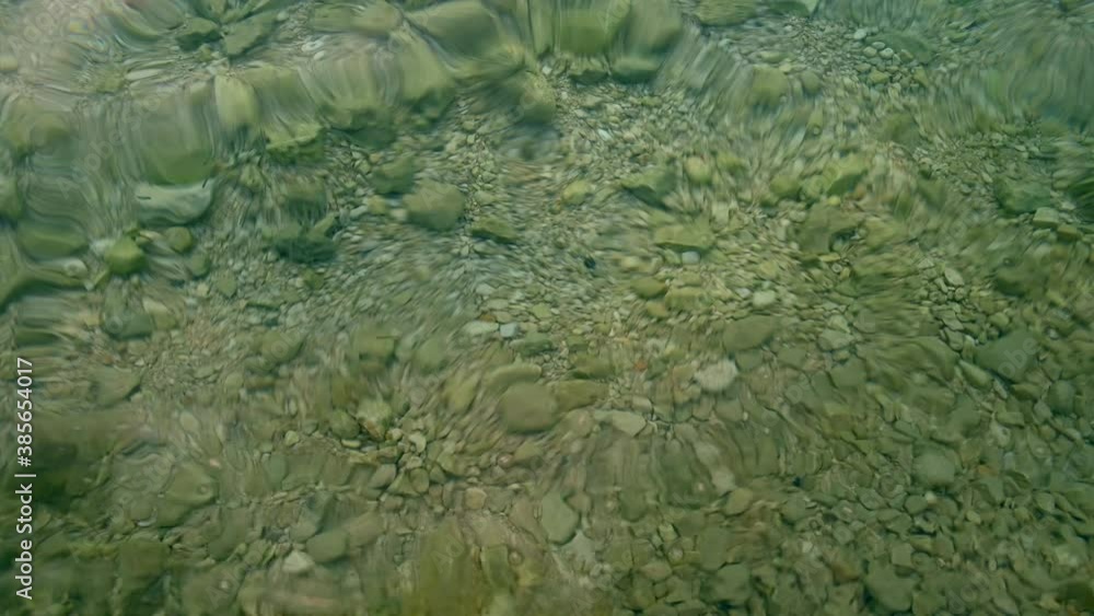 Pristine Ocean Water with Rocky Ocean Floor Close Up Pristine Ocean Water with Rocky Ocean Floor Close Up