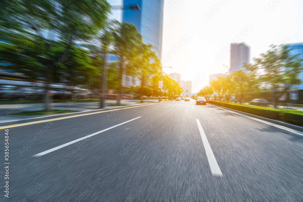 clean road through modern buildings in the city. clean road through modern buildings in the city.