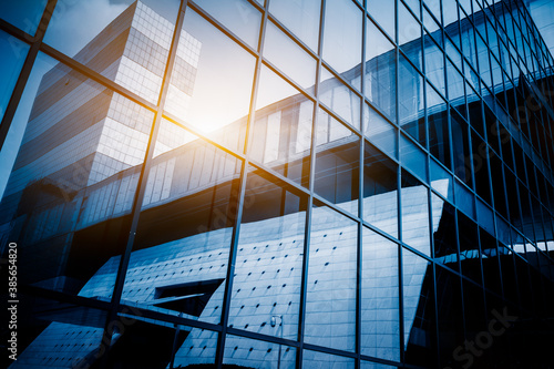Фототапет Urban abstract - windowed corner of office building.
