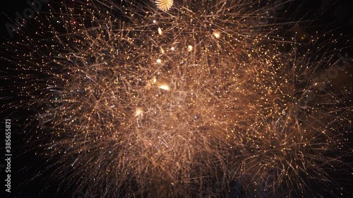 Sky full of fireworks during concert celebration  - night-time slow motion photo