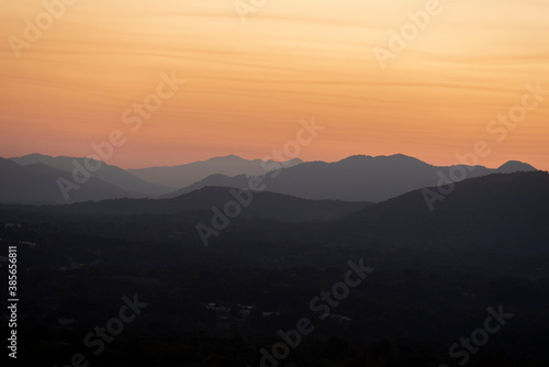 Layers of mountains at sunset