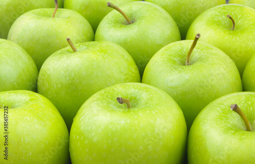 Fresh green apples background 