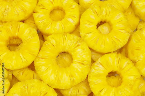 Juicy pineapple rings background	