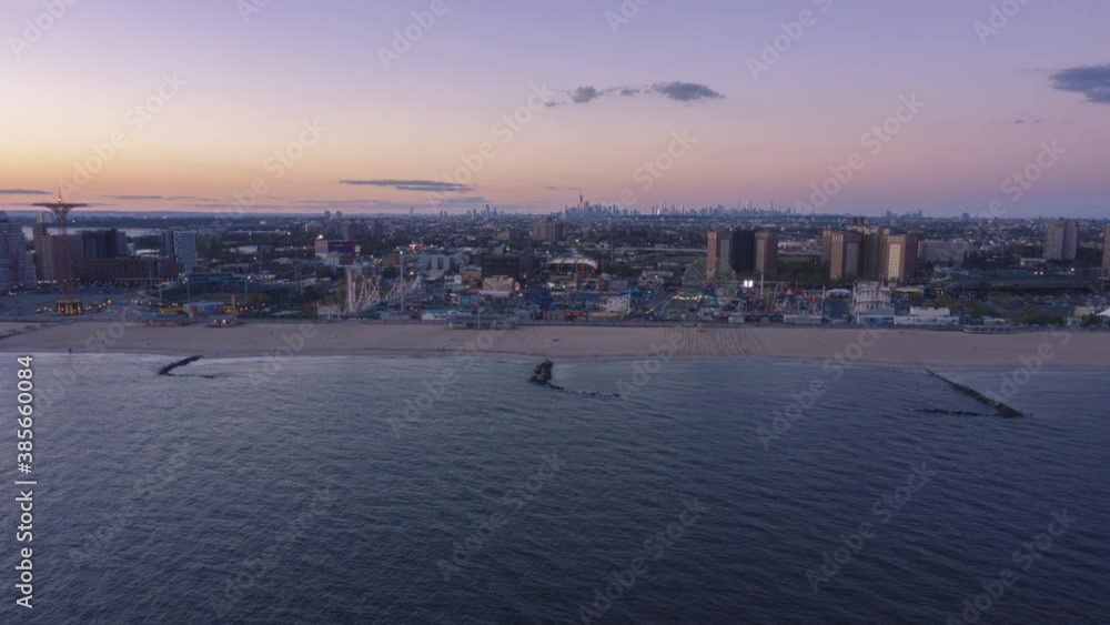 Coney Island timelapse at sunset from drone view Coney Island timelapse at sunset from drone view