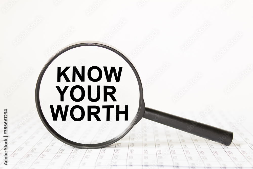 text KNOW YOUR WORTH in a magnifying glass, office concept, business concept, Finance text KNOW YOUR WORTH in a magnifying glass, office concept, business concept, Finance