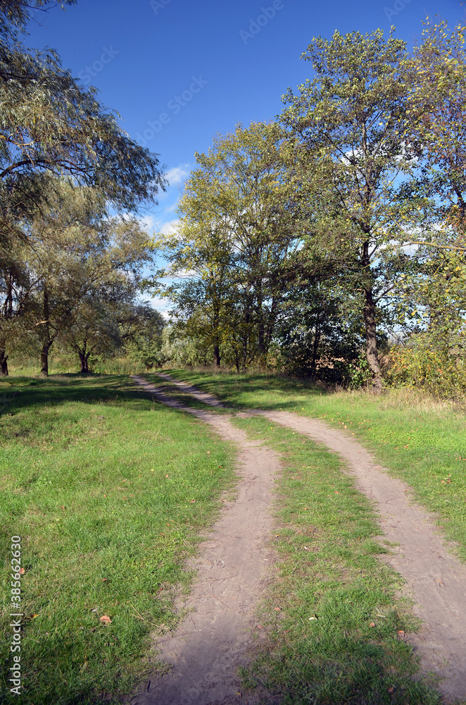 Dirt road.Natural landscape in Kiev Region at autumn Dirt road.Natural landscape in Kiev Region at autumn
