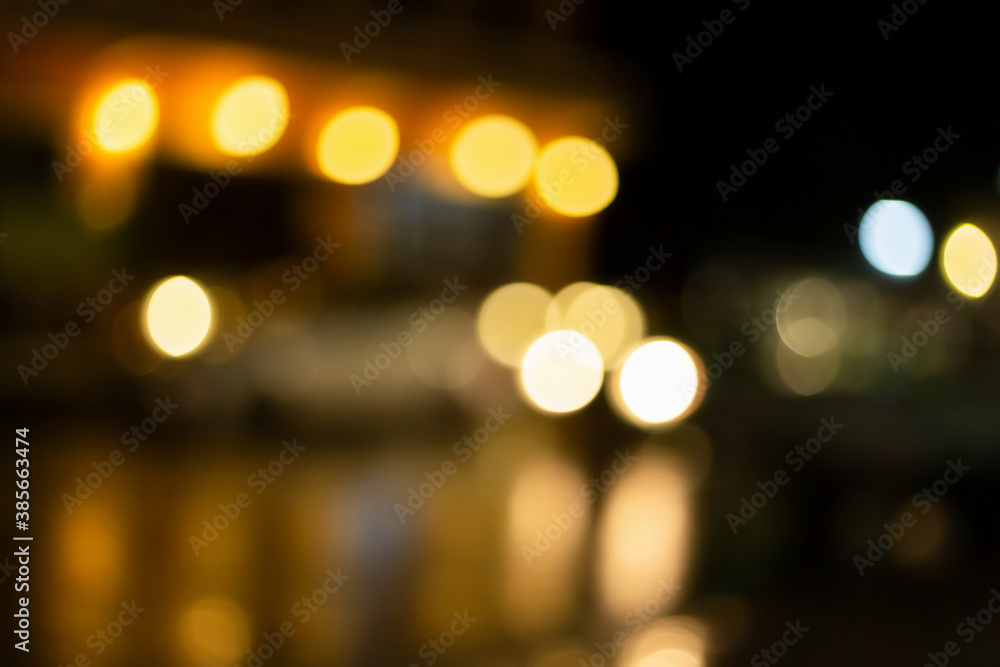 Christmas and Happy new year on blurred bokeh lights on black background. Christmas and Happy new year on blurred bokeh lights on black background.