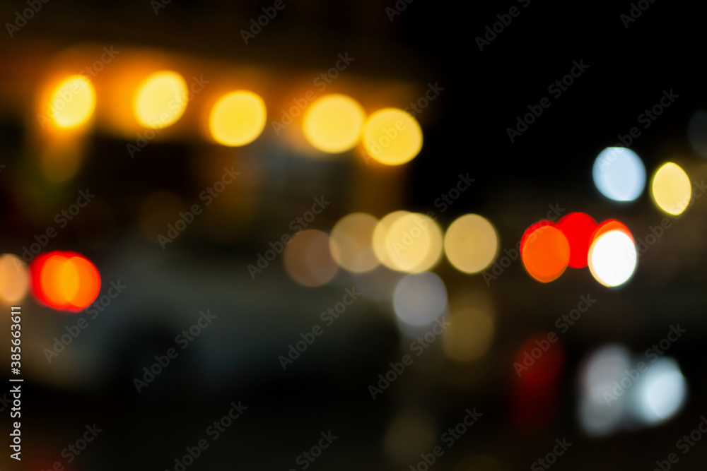 Christmas and Happy new year on blurred bokeh lights on black background. Christmas and Happy new year on blurred bokeh lights on black background.