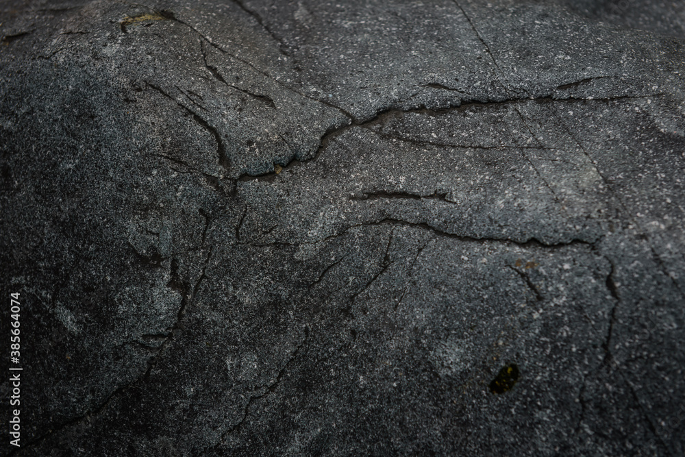 Dark gray stone texture. Industrial design background. Abstract grunge. Old rough black granite surface. Image with copy space. Dark gray stone texture. Industrial design background. Abstract grunge. Old rough black granite surface. Image with copy space.