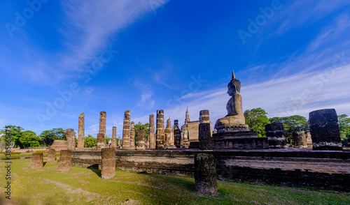 temple mahathat in sukhothai at sunset.