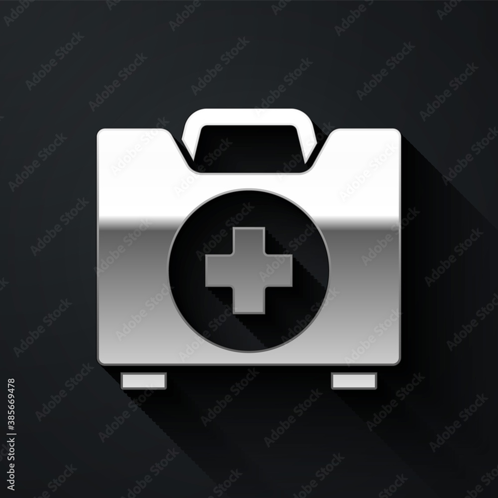 Fototapeta premium Silver First aid kit icon isolated on black background. Medical box with cross. Medical equipment for emergency. Healthcare concept. Long shadow style. Vector Illustration.