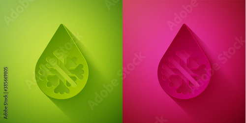 Paper cut Defrosting icon isolated on green and pink background. From ice to water symbol. Paper art style. Vector Illustration.