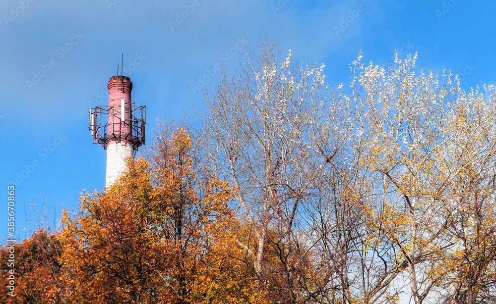 Obraz premium Autumn landscape with industrial tube in Moscow