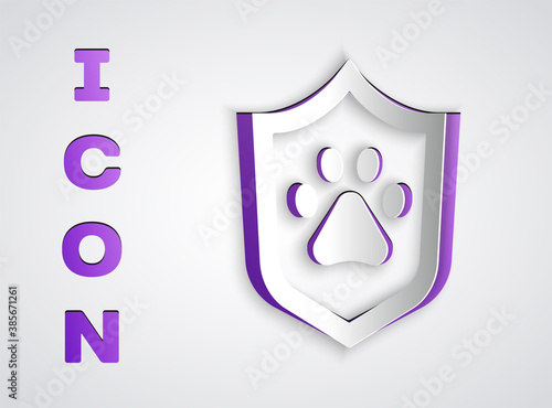 Paper cut Animal health insurance icon isolated on grey background. Pet protection concept. Dog or cat paw print. Paper art style. Vector.
