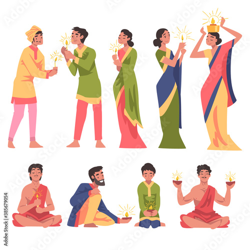 Diwali Hindu Holiday, Indian People in Traditional Clothes Celebrating Light Festival with Glowing Candles Cartoon Style Vector Illustration