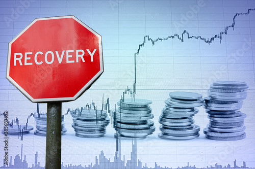Canvas Print Recovery stop sign against economic background with graph and coins