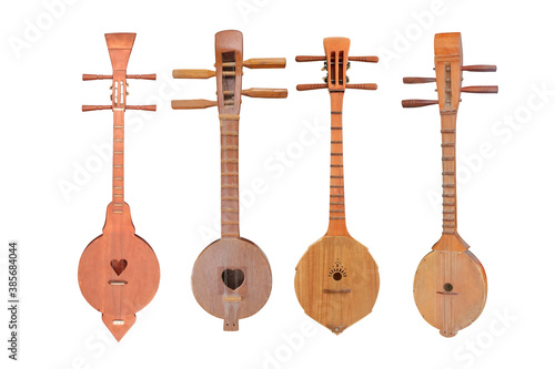 Collection of Thai musical instruments. Lanna ancient sing-song style isolated on white with clippng path. photo