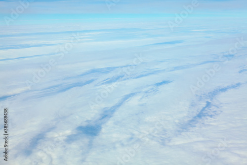 Only clouds below . White snowy cloudscape background
