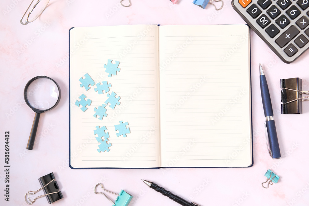Notebook paper on white table background and space for text Notebook paper on white table background and space for text