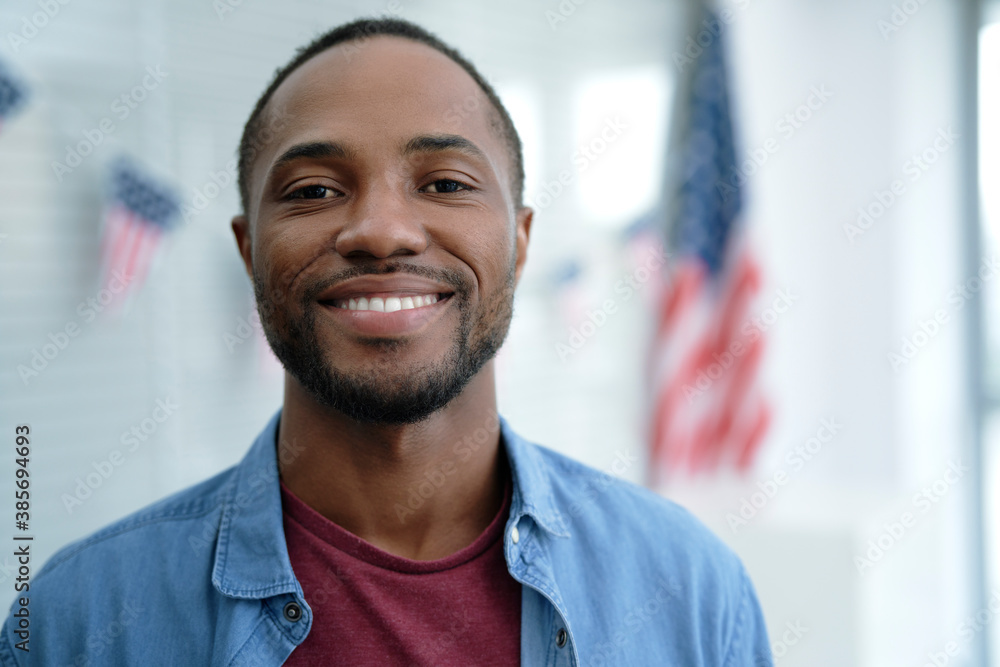 Fototapeta premium Portrait of black man in ballot place