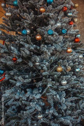 christmas tree background with snow and christmas decorations photo