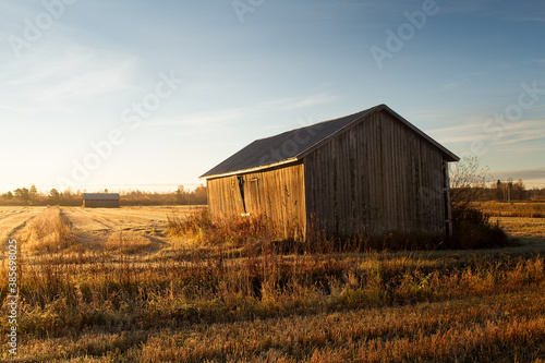 Barn Houses In The Autumn Sunrise