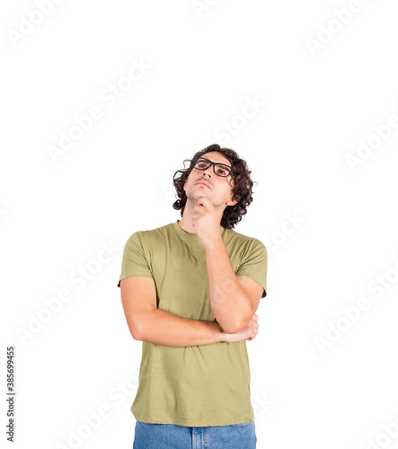 Photography Pensive young man student or professor, long curly hair style wearing eyeglasses, keeps hand under chin, thoughtful gesture, isolated on white