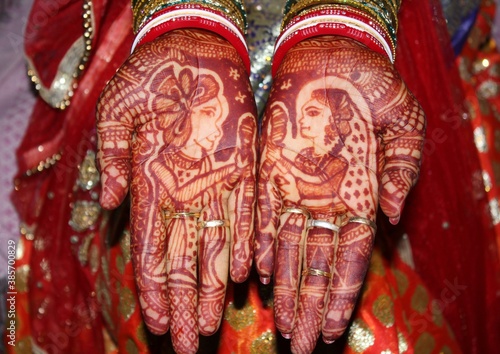  marriage, Indian traditional marriage system and a girl is showing palm. marriage couple show the (mehandi hand) mehndi tattoo.