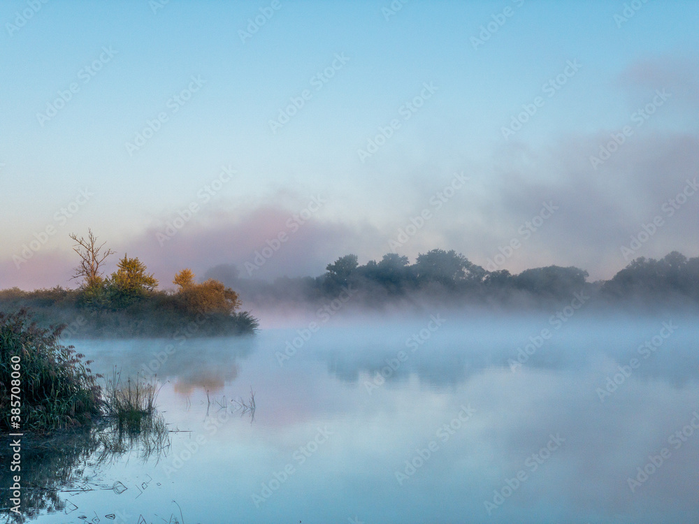 Foggy morning water reflection