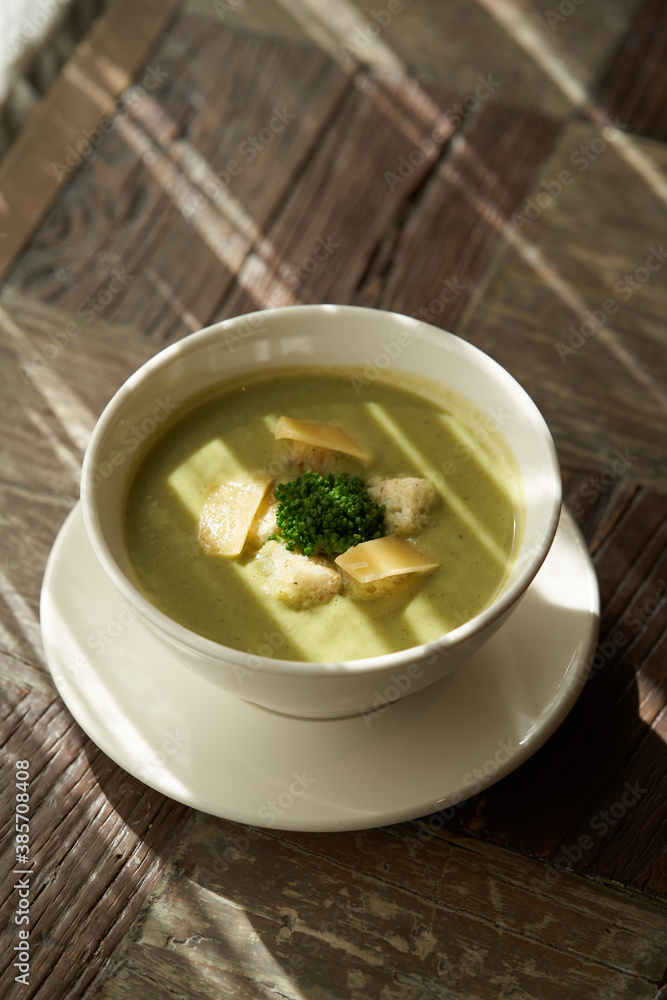 Bowl of cream of broccoli soup, close-up Bowl of cream of broccoli soup, close-up