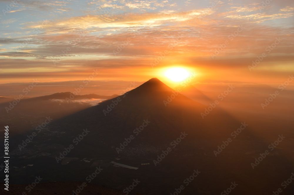 Sunrise hiking and camping on the top of the active Volcan Acatenango while the Volcano Fuego is erupting - Guatemala Sunrise hiking and camping on the top of the active Volcan Acatenango while the Volcano Fuego is erupting - Guatemala