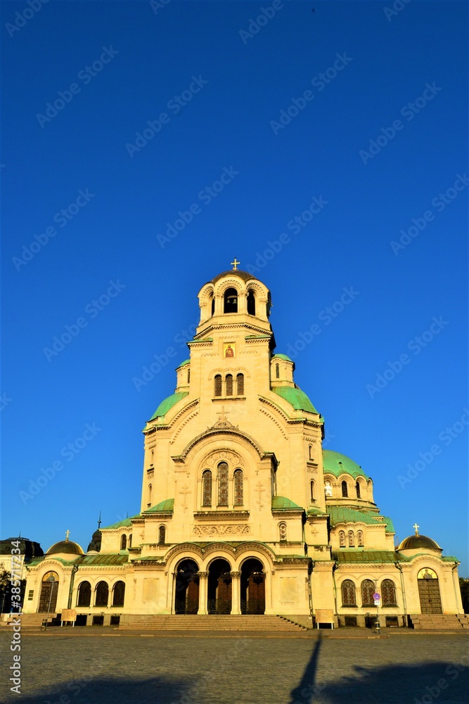 Alexander Nevsky Cathedral during sunset, Sofia. Bulgaria. Blue sky and shiny day.