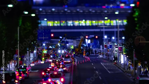 A night timelapse of the miniature urban city street in Shibuya Tokyo tiltshift zoom photo