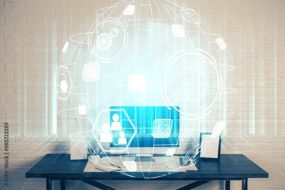 Computer on desktop with social network hologram. Multi exposure. Concept of international people connections. Computer on desktop with social network hologram. Multi exposure. Concept of international people connections.