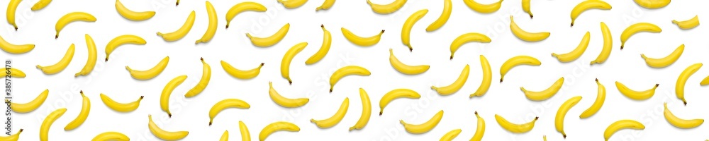 Bananas creative background. pop art bananas background. Tropical abstract background with banana. Colorful fruit yellow banana