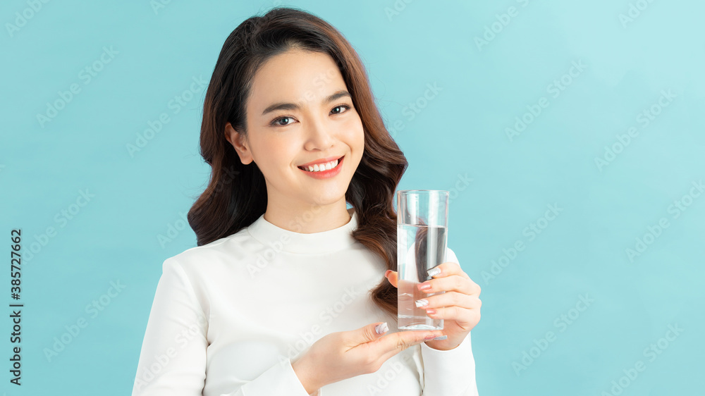Face portrait of woman drinking water. Smiling girl. Isolated portrait. Face portrait of woman drinking water. Smiling girl. Isolated portrait.