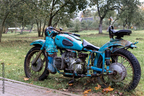 Old  rusty Soviet motorcycle